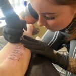Female breast Tattoo artist